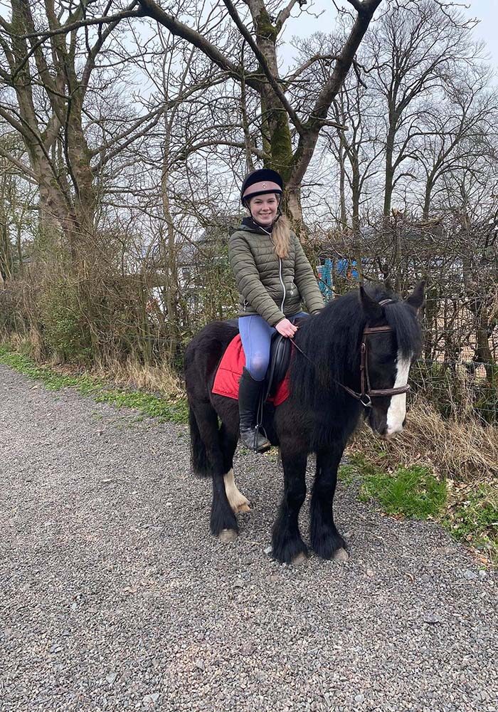 Magic-portrait Girl riding a black horse in County Antrim