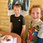 2 boys with a birthday cake in County Antrim